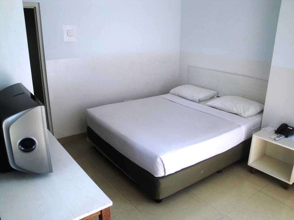 Hotel Metropolitan Inn Manado Room photo